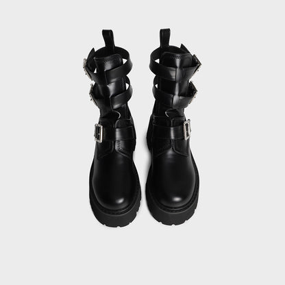 Tragen Sie modische Damenstiefel mit rundem Kopf und dicker Sohle