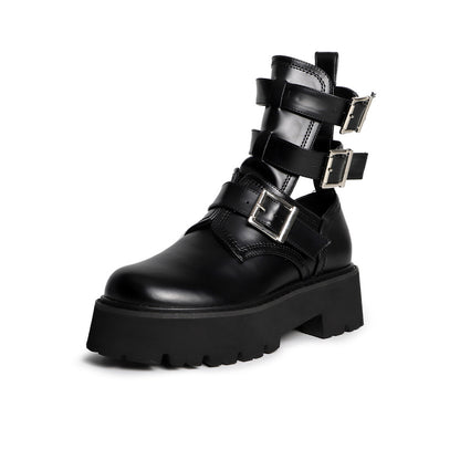 Tragen Sie modische Damenstiefel mit rundem Kopf und dicker Sohle