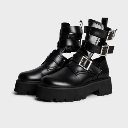 Tragen Sie modische Damenstiefel mit rundem Kopf und dicker Sohle